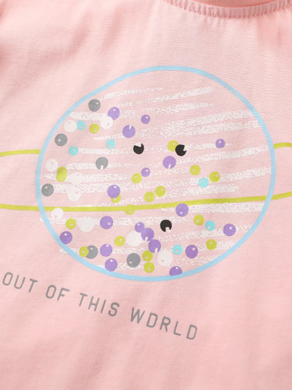 Pink cotton t-shirt with a planet graphic and "OUT OF THIS WORLD" text.
