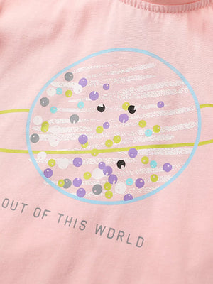 Pink cotton t-shirt with a planet graphic and "OUT OF THIS WORLD" text.