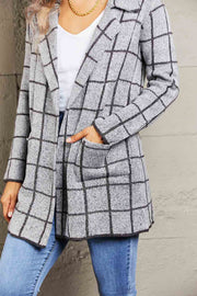 Gray grid-print knit blazer coat with lapels and patch pockets, acrylic blend.