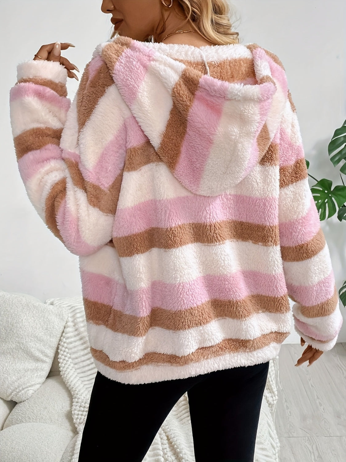 Teddy stripe zip-up hoodie in blush pink and brown fuzzy material with a hood.