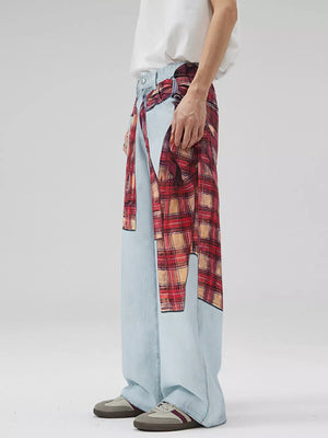 Men's light wash denim jeans with red plaid patchwork and wide legs.