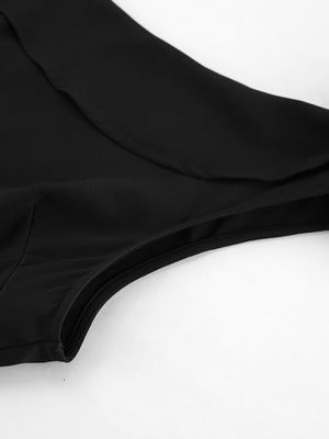 Black asymmetrical mini dress with a draped detail and scoop neckline.