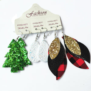 Festive drop earrings set with Christmas trees, white teardrops, and buffalo plaid leaf designs.