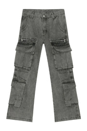 Acid wash flared cargo jeans in medium with multiple zippered and pleated pockets.