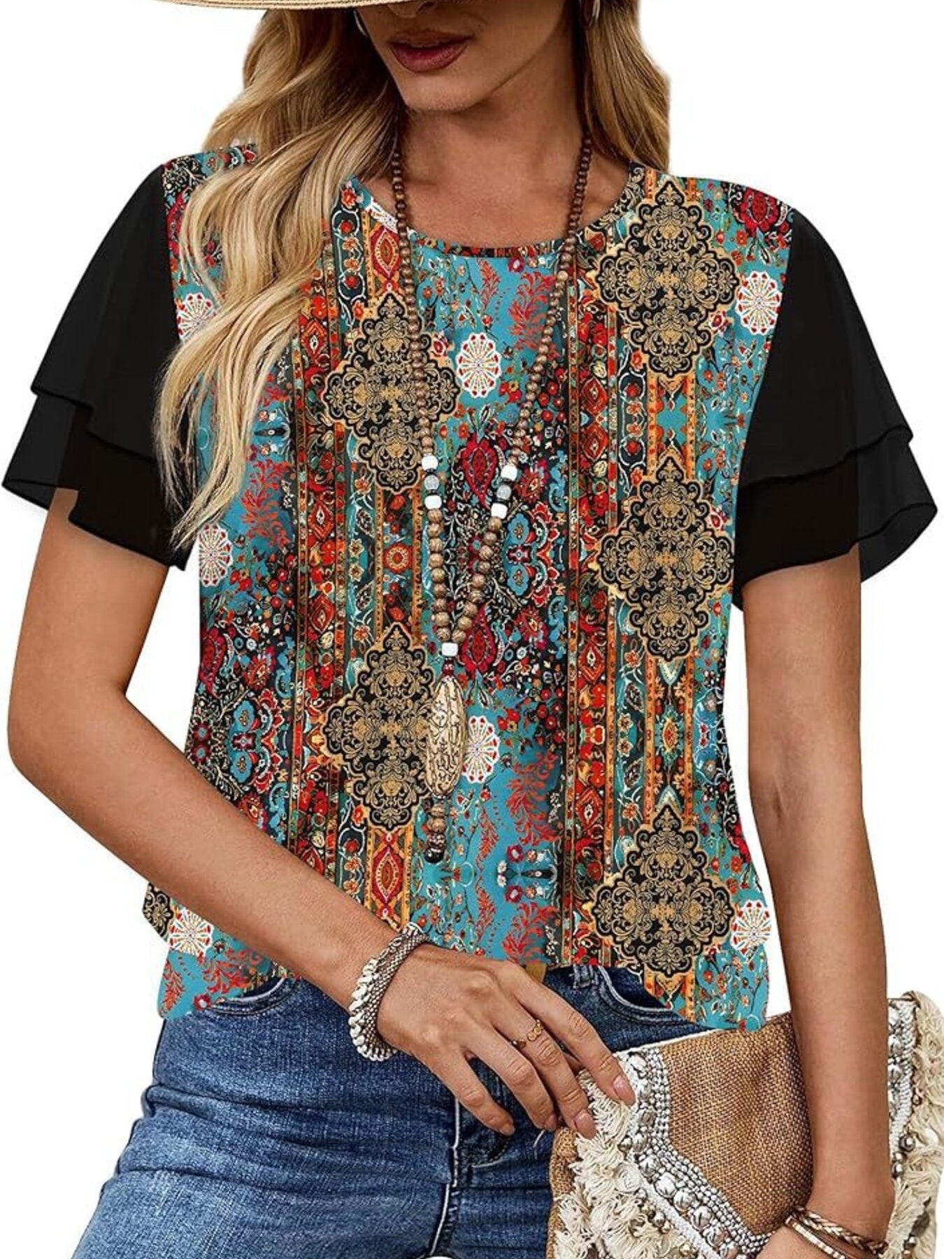 Layered ruffled short sleeve t-shirt in multicolor floral print with black sleeves.