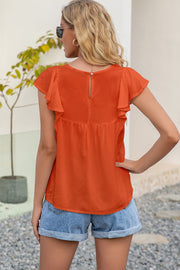 Orange ruffle sleeve blouse with embroidered yoke and keyhole back.