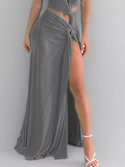 Gray maxi dress with plunging V-neck, cutout detail, and high slit.
