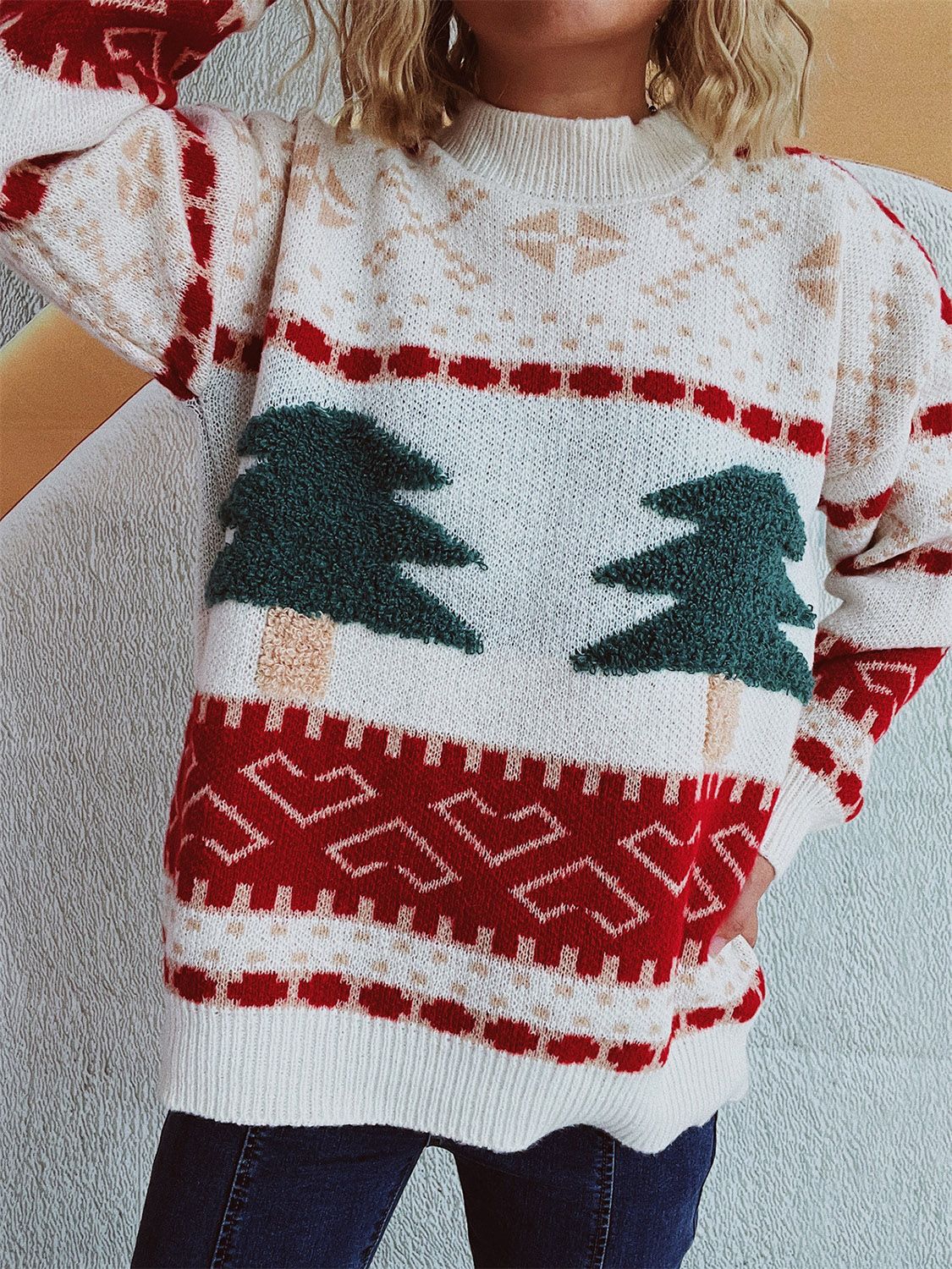 Festive appliqué tree knit sweater in beige and scarlet with Fair Isle pattern.