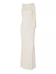 Apricot asymmetrical draped maxi dress with one shoulder and elegant neckline.