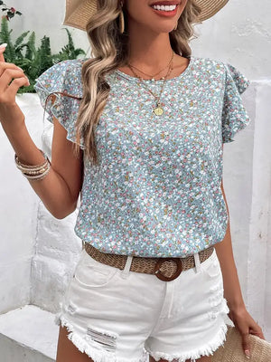 Light blue floral flutter sleeve blouse with a round neckline.