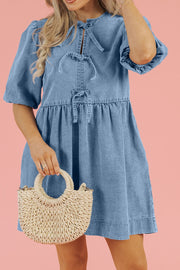Prairie denim dress in medium with puff sleeves and tie details