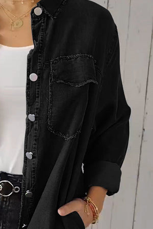 Black oversized denim shirt jacket with frayed pocket details and silver buttons.