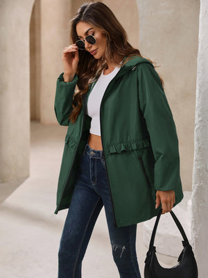 Dark green hooded windbreaker jacket with ruffled waistline and zip pockets