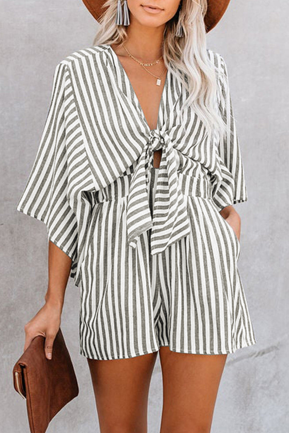 Striped tie-front kimono jumpsuit in dark gray with short sleeves and a V-neck.