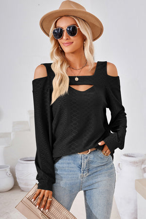 Black geometric cutout shoulder top with long sleeves and a square neckline.