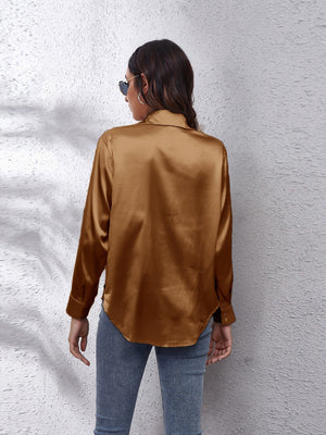 Luxe satin collared button-down shirt in camel with long sleeves and a curved hem.