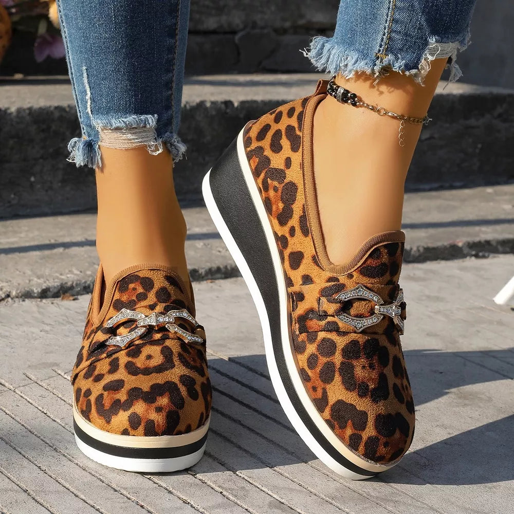 Brown leopard print wedge loafers with buckle detail and stacked sole