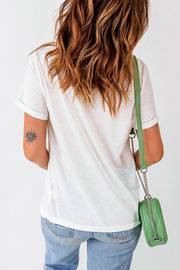 White casual t-shirt with rolled sleeves and an eye tattoo on the arm.
