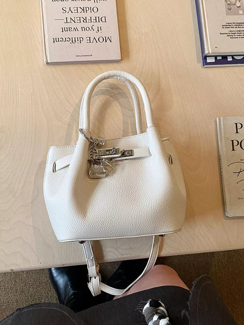 Leather Crossbody Bag With Lock Detail in White, fabric detail
