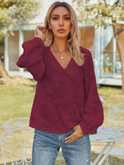 Burgundy textured puff sleeve v-neck blouse with long sleeves