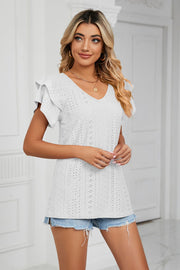 White eyelet knit blouse with V-neck and flutter sleeves