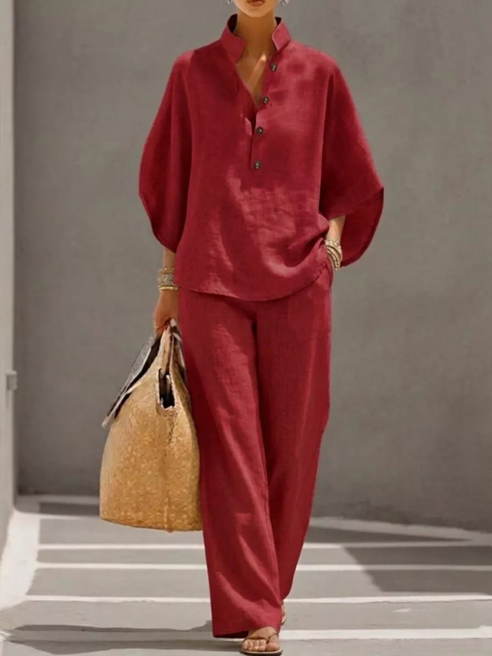 Burgundy button-down loungewear set with wide sleeves and wide-leg pants.