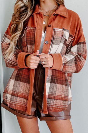 Colorblock plaid shacket in terracotta with contrast cuffs and button front.