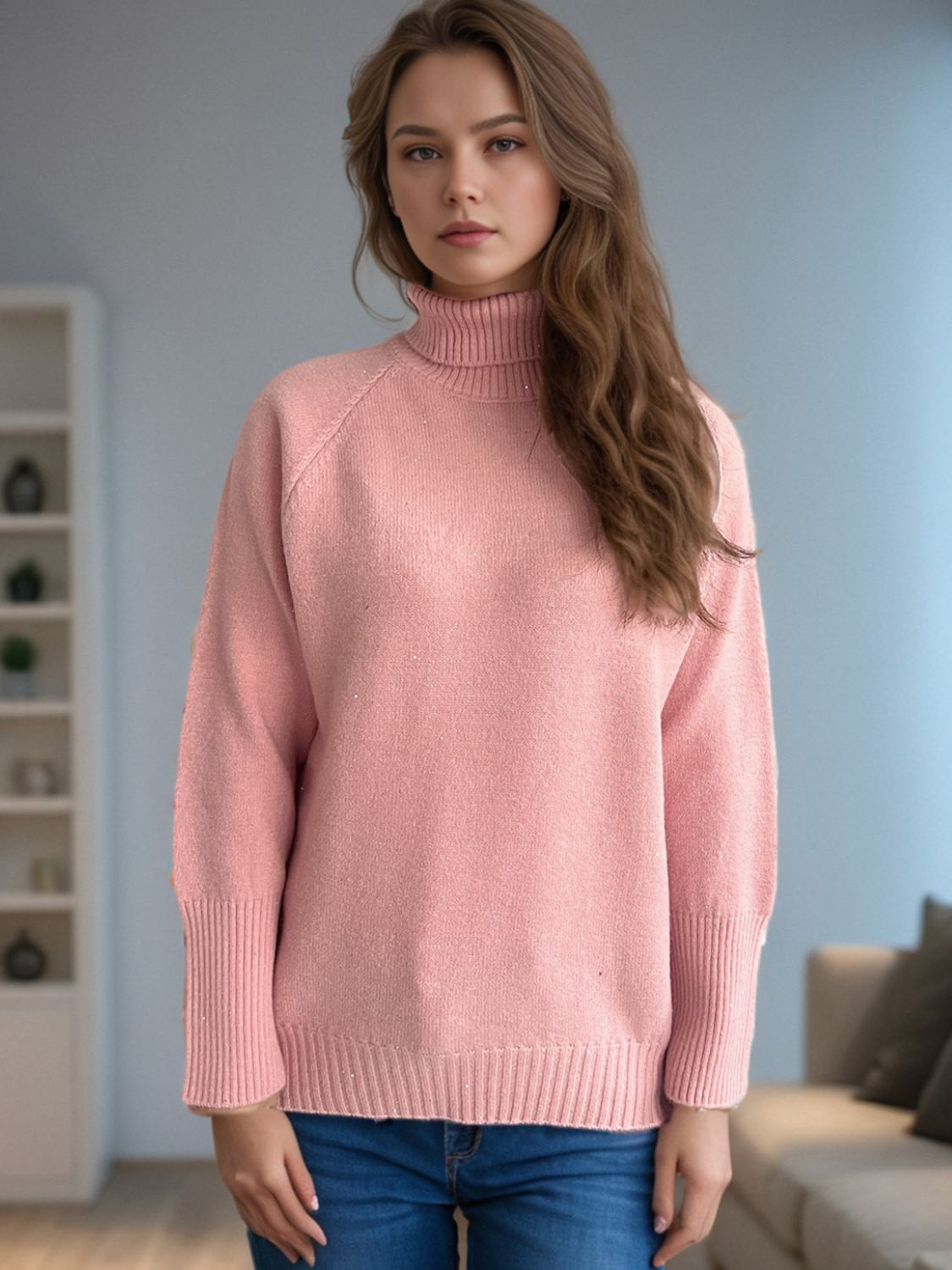 Dusty Pink ribbed turtleneck sweater with subtle sparkle detail and cuffed sleeves.