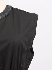 Black midi dress with faux leather collar and side pockets.