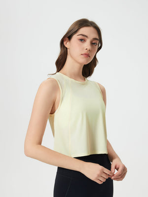 Pastel Yellow mesh-inset back cropped active tank top with crew neck and sleeveless design.