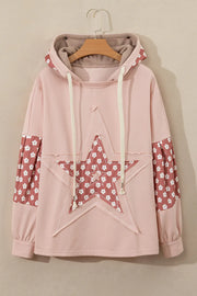 Dusty pink hoodie with floral star patchwork on front and sleeves, drawstring hood.