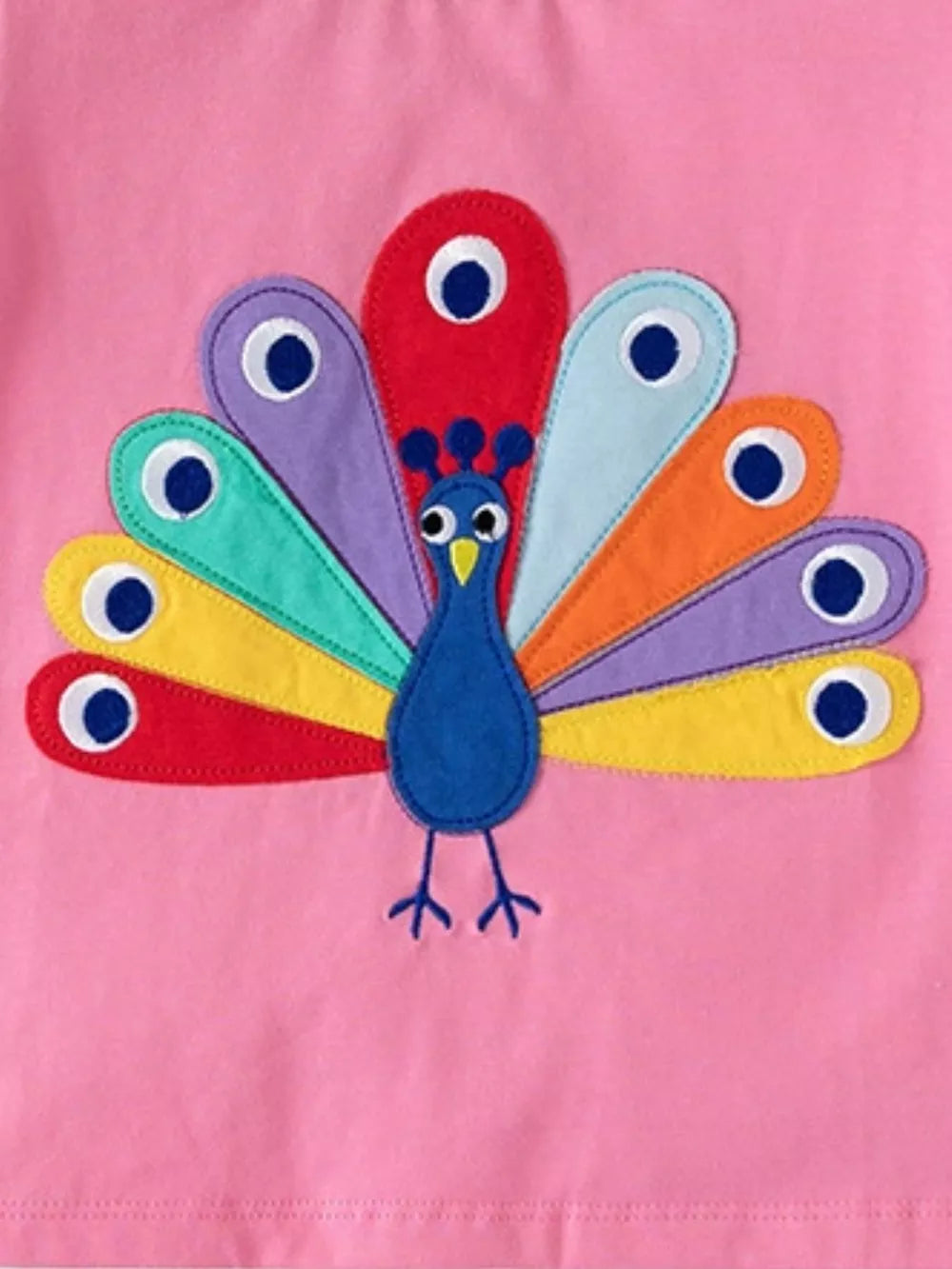 Pink cotton toddler set with a colorful peacock embroidery detail.