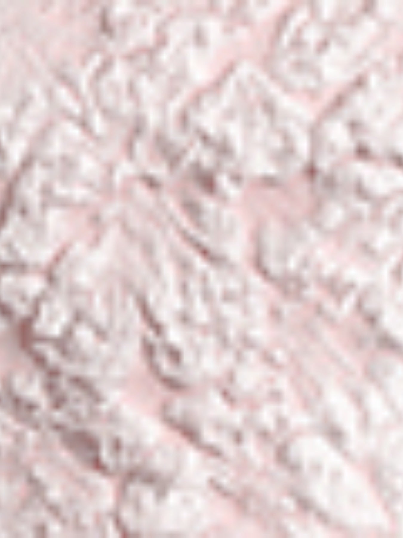 Textured dusty pink peplum tank top with a floral pattern and boat neckline.