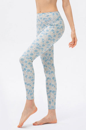 Skinny leggings in light blue floral print with a high waist
