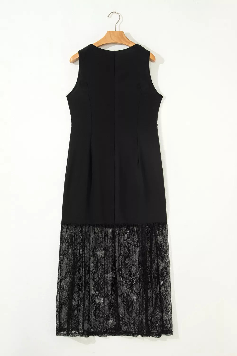 Black lace maxi dress with sheer lace hem detail.