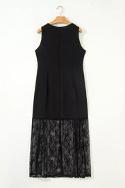 Black lace maxi dress with sheer lace hem detail.