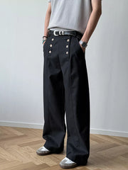 Black high-waisted wide leg pants with button detail and a relaxed fit.