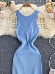 Light blue ribbed knit midi dress with scoop neck and sleeveless design.