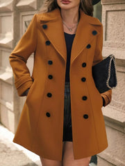 Caramel wool blend double-breasted trench coat with cuffed sleeves and black buttons.
