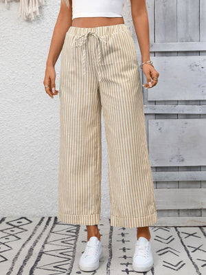 Drawstring wide leg pants in apricot stripe with pockets and cuffed hem.