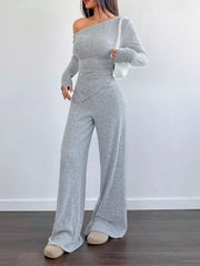 Light gray ribbed one-shoulder top with asymmetrical hem and wide-leg pants set.