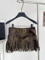 Belted mini skirt in brown with antique brass buckles and fringe detail.