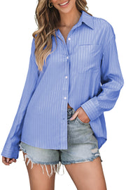 Oversized blue striped button-up shirt with chest pocket and collar.