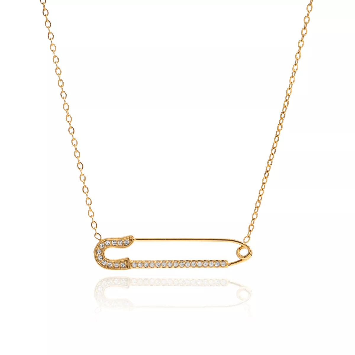 Gold layered necklace with a diamond-accented safety pin pendant.