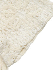 Delicate floral lace tie-front shirt in ivory with open knit and cutout details.