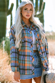 Oversized plaid shacket with button-down collar in orange and blue tones.