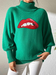 Green turtleneck sweater with sequin red lips detail and balloon sleeves.