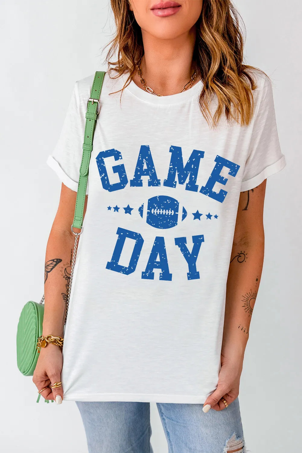White t-shirt with blue distressed "GAME DAY" football graphic and stars.