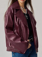 Plum purple faux leather biker bomber jacket with a wide collar and zippered front.