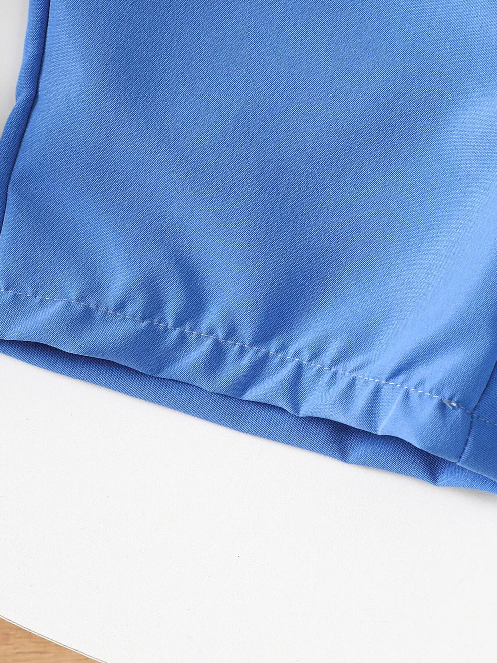 Blue cotton toddler shorts with elastic waistband detail